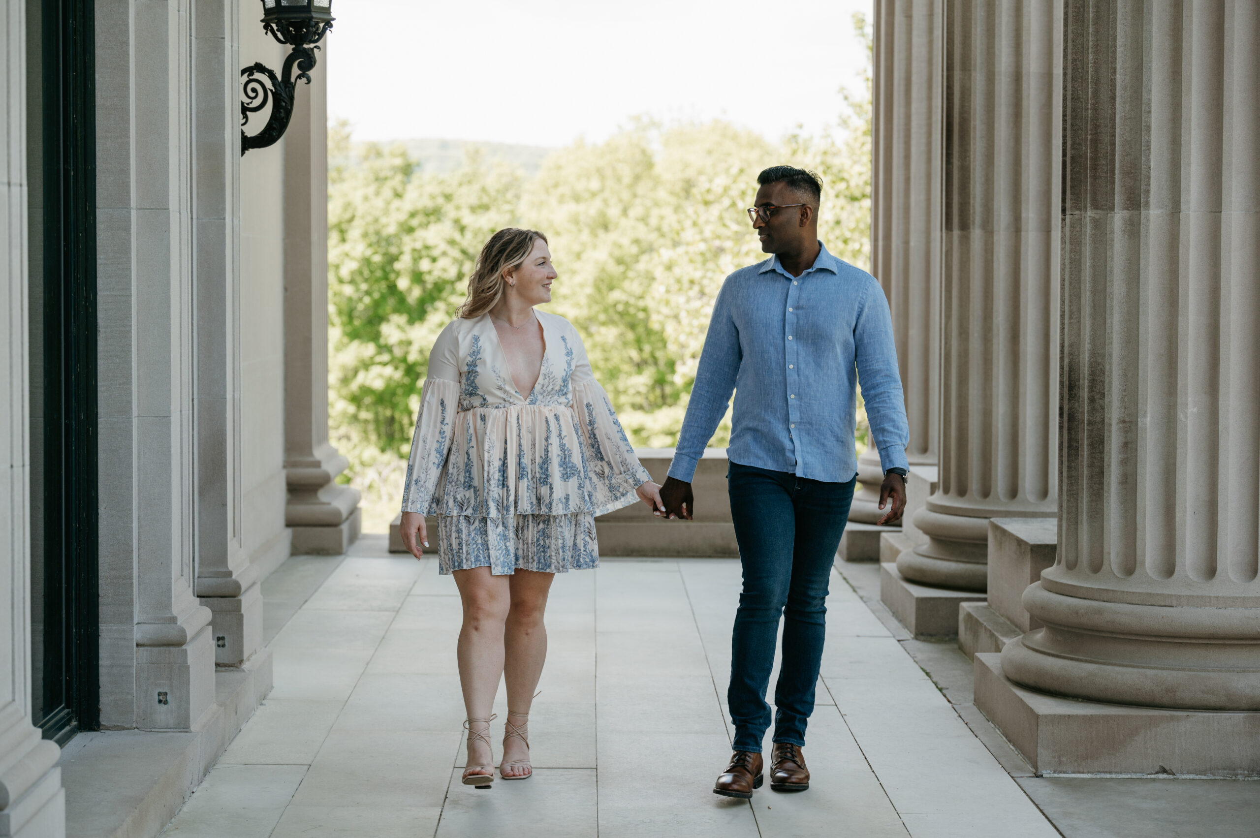Romantic stroll during a Hyde Park engagement session at Vanderbilt Mansion